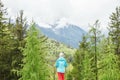 Female hiker in spring forest Royalty Free Stock Photo