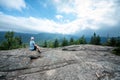 Female hiker at the summit of Mount Jo Lake Placid NY