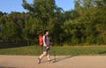 Female hiker walking on a path Royalty Free Stock Photo