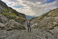 Female hiker in the wilderness of Norway close to Trolltunga rocks