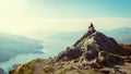 Female hikers on top of the mountain enjoying valley view Royalty Free Stock Photo