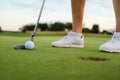 Female Hit Ball With Aluminium Golf Club . Royalty Free Stock Photo