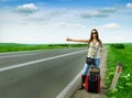 Female hitch-hiker Royalty Free Stock Photo