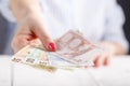 Female hold money in hands Royalty Free Stock Photo