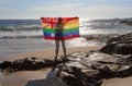 Female holding an Australian flag in rainbow colours Royalty Free Stock Photo