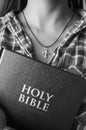 Female holding a bible Royalty Free Stock Photo