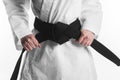 female holding karate black belt. High quality photo