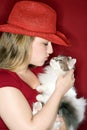Female holding and kissing cat Royalty Free Stock Photo