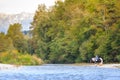 Female horse rider crossing river Royalty Free Stock Photo