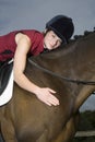 Female Horseback Rider Hugging Horse Royalty Free Stock Photo