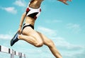 Female hurdle runner Royalty Free Stock Photo