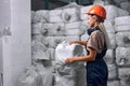 female industrier packing Plastic barrels which contain in factory, preparing for sale