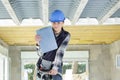 female inspector with clipboard inside property