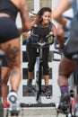 Female Instructor Leads Spin Class At Pretty Girls Sweat Festival