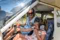 ROMA, ITALY - AUGUST 2018: Female instructor and little girl child at the helm of a light aircraft Royalty Free Stock Photo