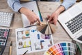Female Interior designer work with architect plan and color palette set Royalty Free Stock Photo