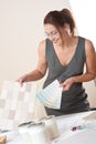 Female interior designer working with color swatch Royalty Free Stock Photo