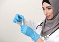 Arab female doctor on white studio background Royalty Free Stock Photo