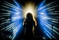 Female jazz singer on stage during a concert illuminated by show lights. Generate Ai. Royalty Free Stock Photo