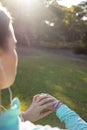 Female jogger checking her fitness band