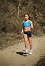 Female Jogger Running in Park