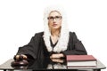 Female judge wearing a wig and Back mantle with eyeglasses with Royalty Free Stock Photo