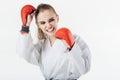 female karate fighter training with gloves and mouthguard