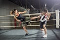 Female kick boxer practicing