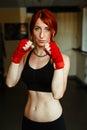 female kickboxing fighter in gym