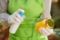 Female in kitchen disinfecting groceries after supermarket