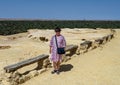 Female Korean tourist at Gebel Al Mawta, the `Mountain of the Dead`, in Siwa Oasis, Egypt. Royalty Free Stock Photo