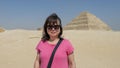 Female Korean tourist at the Step Pyramid of Djoser in Egypt.