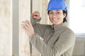 female labourer screwing into wood Royalty Free Stock Photo