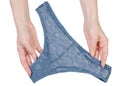 Female lace blue panties in hand