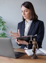 soft selective focus, female lawyer conducts an online consultation from a laptop via video link for a client. work in a