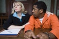 Female Lawyer With Criminal In Courtroom Royalty Free Stock Photo