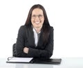 Female lawyer young professional sitting at office desk or table, front view