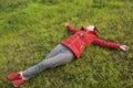 Female laying on lawn