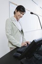 Female Lecturer Using Computer