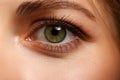 Female left emerald green coloured eye extreme closeup Royalty Free Stock Photo