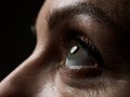 Female left green coloured eye extreme closeup Royalty Free Stock Photo