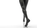 Female legs in black glossy color on a white background. Slender barefoot woman is walking. Black mannequin or sculpture. Creative