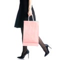 Female legs in black high heels shoes bags package black skirt fashion Royalty Free Stock Photo