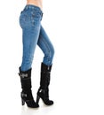 Female legs in a blue jeans and high boots Royalty Free Stock Photo