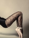 Female legs dancer in ballet shoes