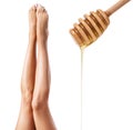 Female legs depilation by honey or sugar pasta. Royalty Free Stock Photo