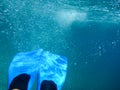 Female legs with flippers underwater view Ithaca island, Molos Gulf, Ionian Sea, Greece Royalty Free Stock Photo