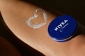 Female legs and nivea cream love