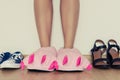 Female legs in slippers Royalty Free Stock Photo