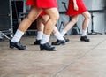 Female legs of three irish dancers